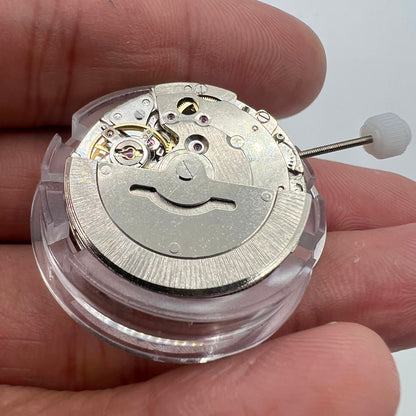 DG2813 automatic watch movement with visible mechanical gears and day-date function for replacements.