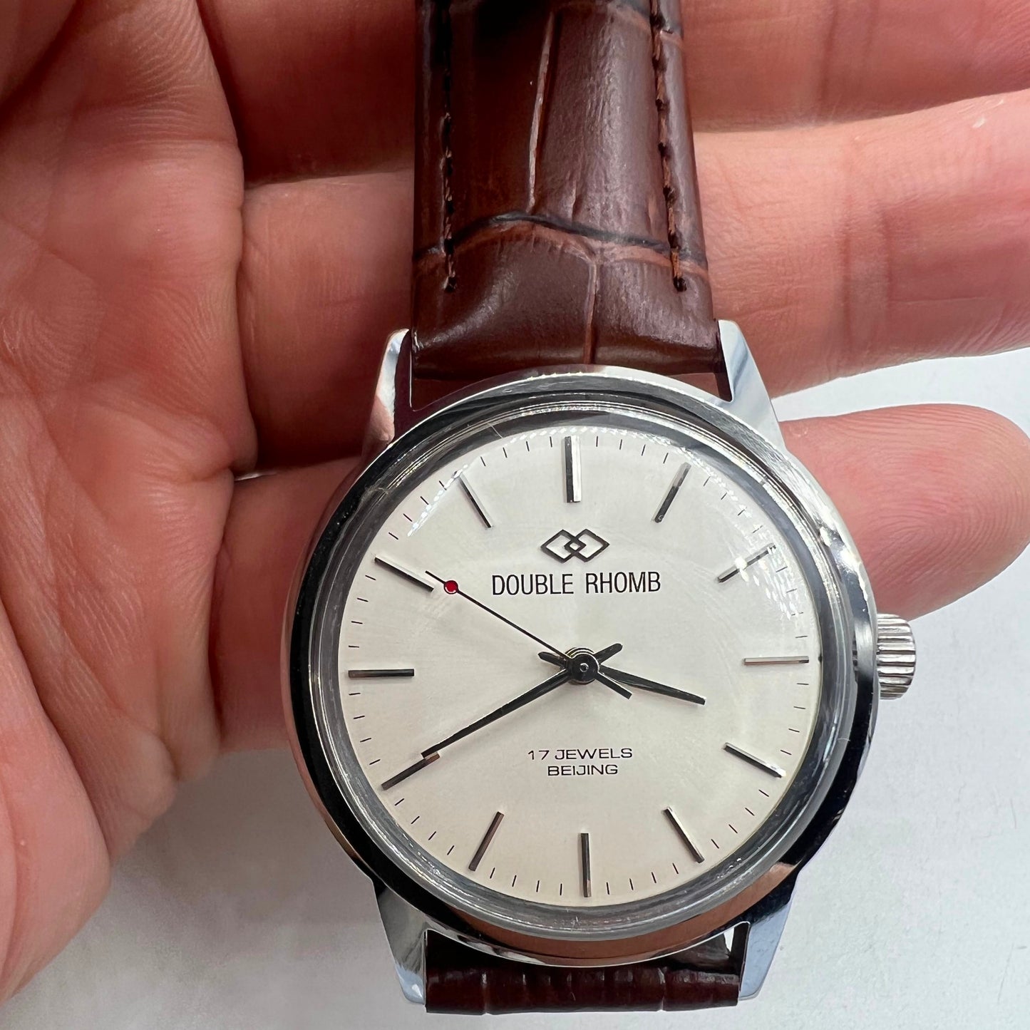 Beijing 36mm Double Rhomb manual watch with silver case and hour markers, classic style accessory.