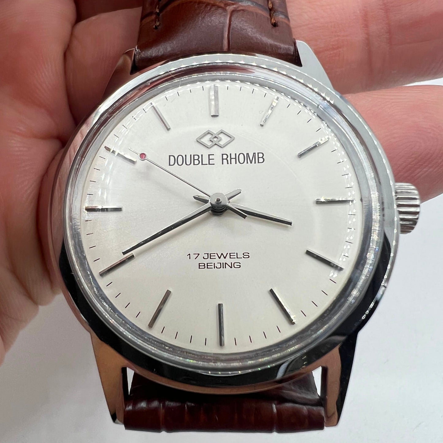 Beijing 36mm Double Rhomb watch with silver case, manual movement, and silver nail markers for elegant style.