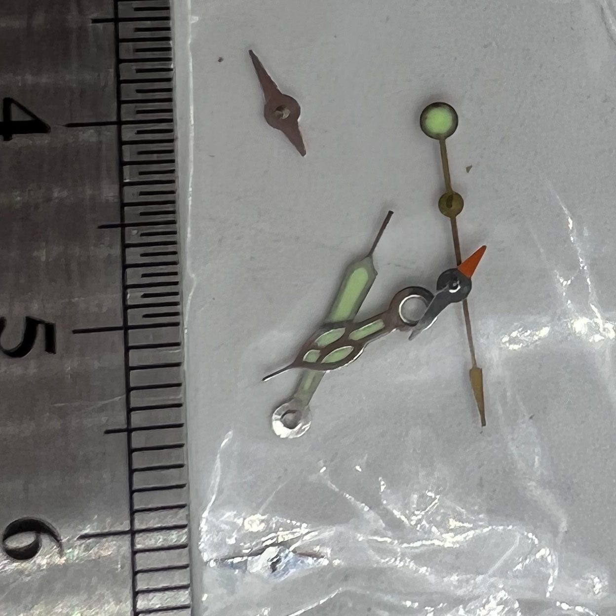 Red second hand with 11.5mm length and green luminous tip for Miyota OS10, OS20, OS60, OS80 watches.