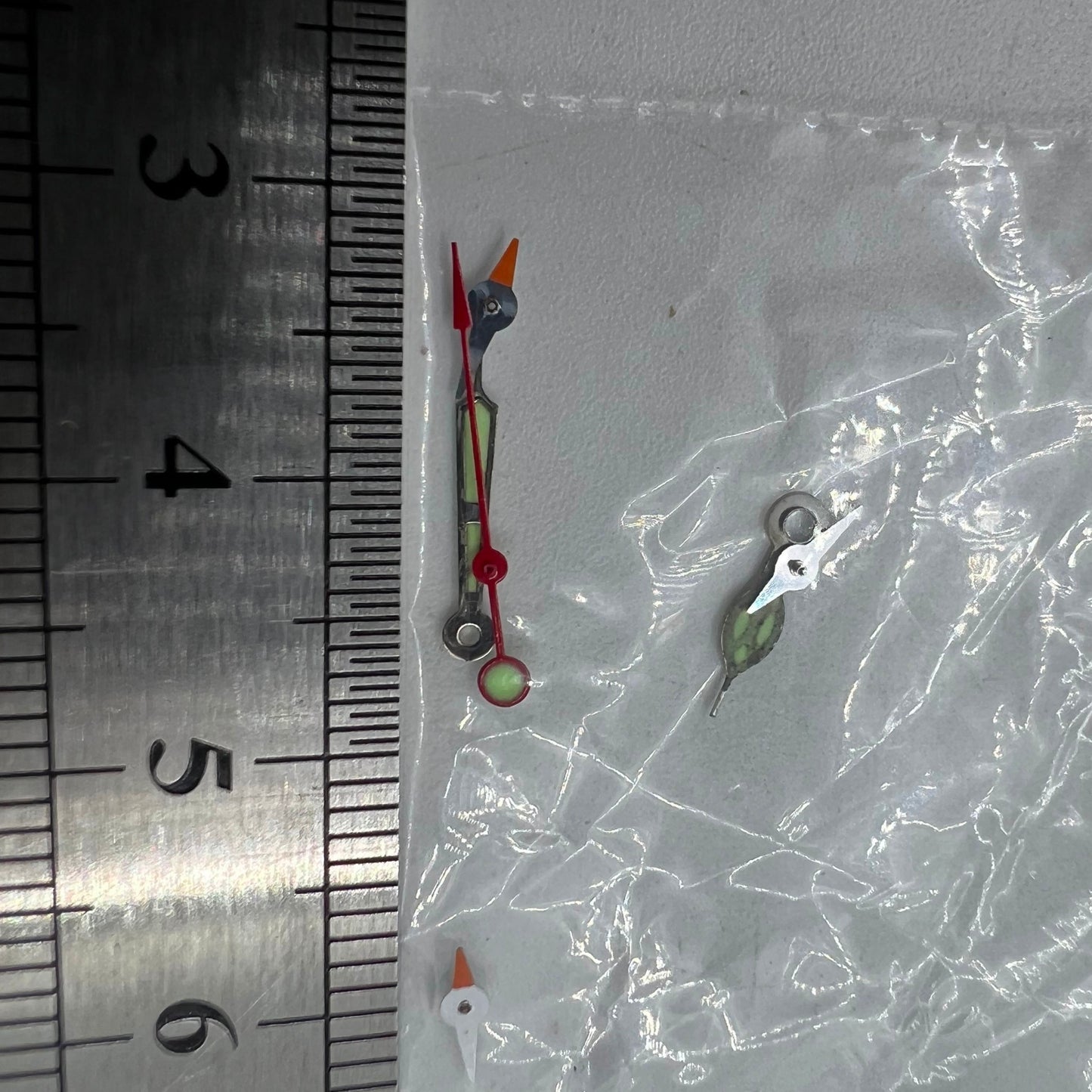 Red second hand with 11.5mm length and green luminous tip for Miyota OS series watches.