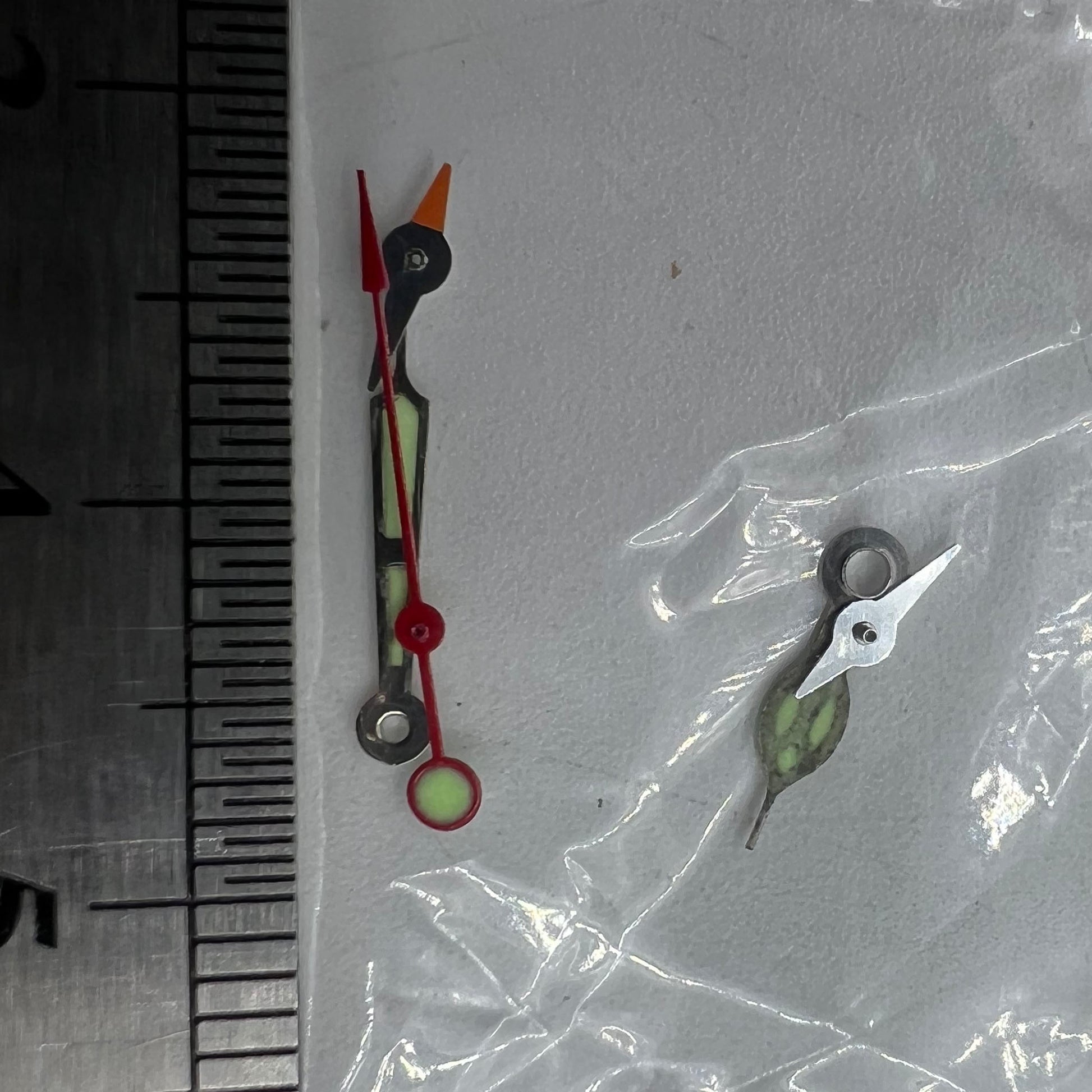 Red second hand with 11.5mm length and green luminous tip for Miyota OS10, OS20, OS60, OS80 watches, perfect for precise timekeeping.