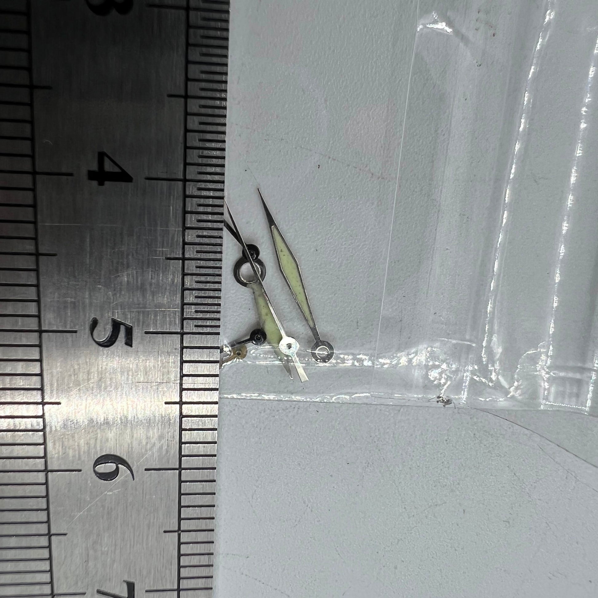 Silver-trimmed green luminous watch hands for Miyota OS60, precise 15x13x9mm size by BrandName.