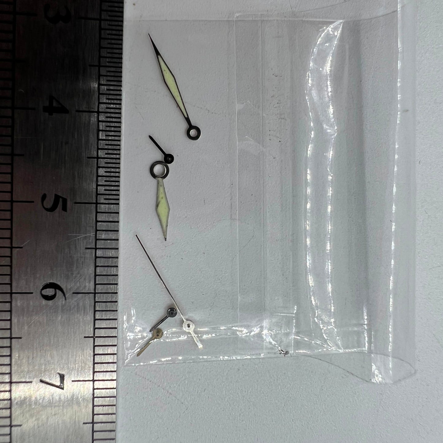 Silver-trimmed green lume watch hands for Miyota OS60, 15x13x9mm precision fit.