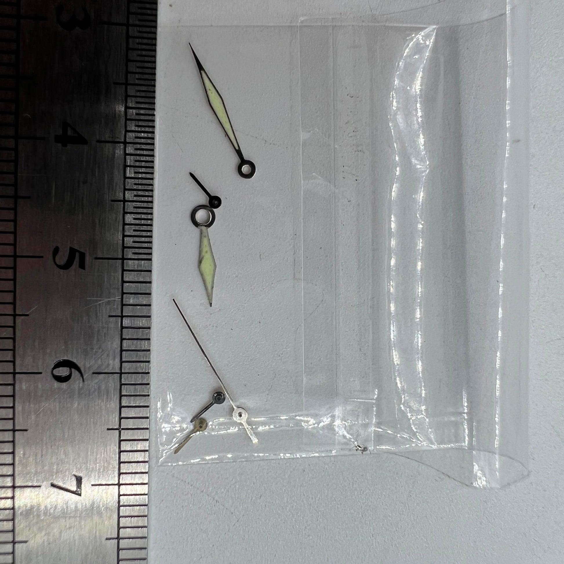 Silver-trimmed green lume watch hands for Miyota OS60, 15x13x9mm precision fit.