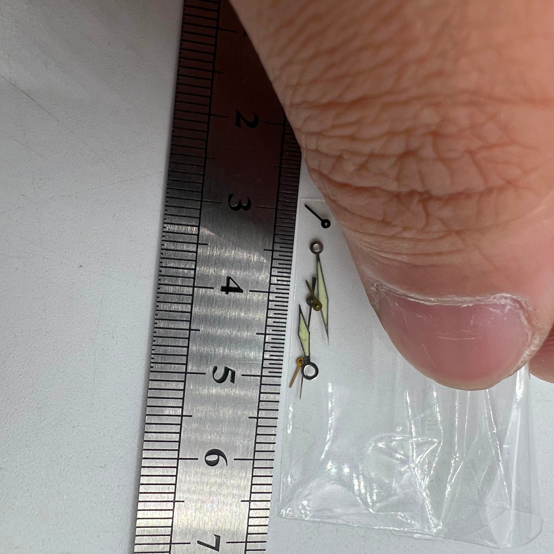 Silver-trimmed green luminous watch hands for Miyota OS60 movement, 15x13x9mm.