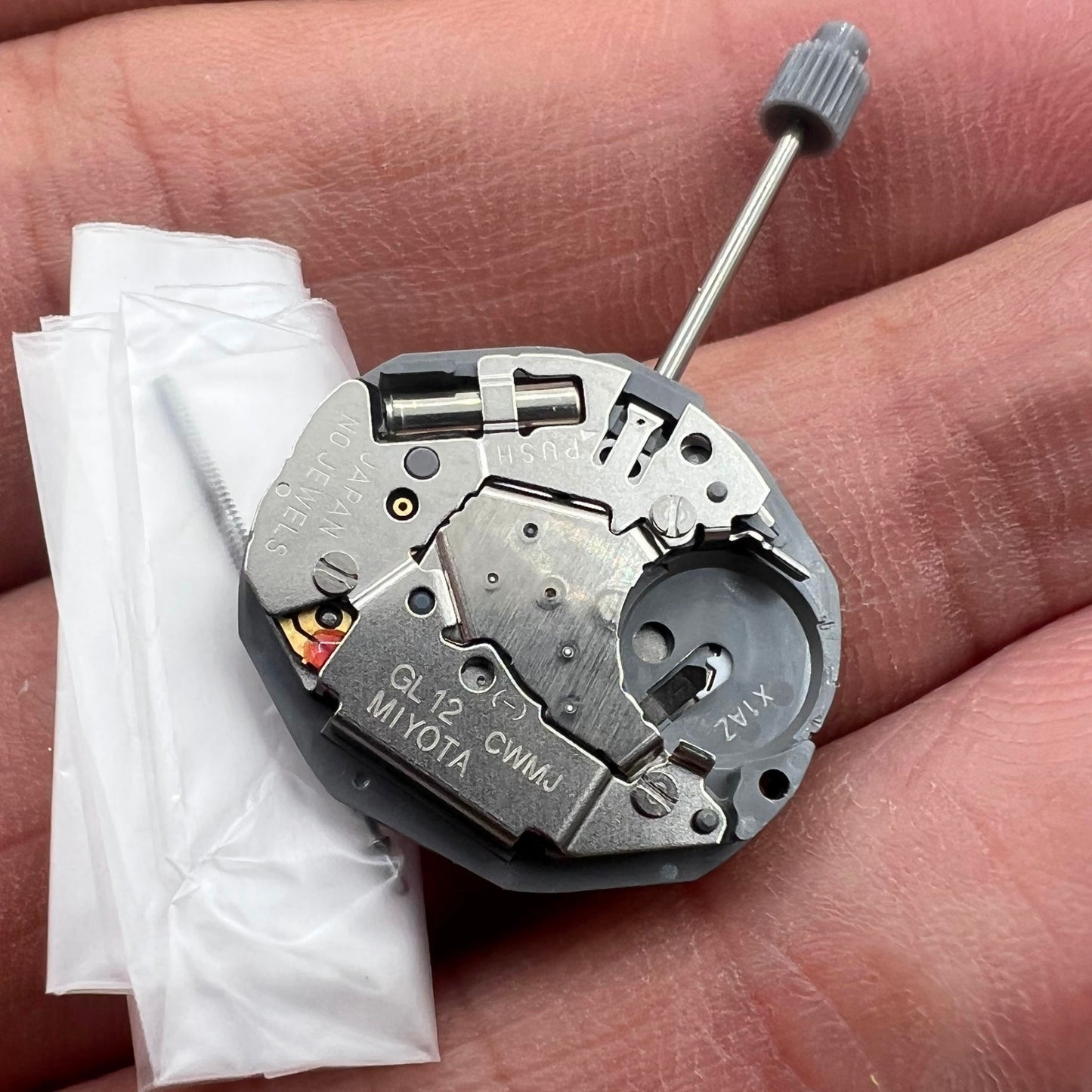 Miyota GL12 quartz watch movement with date display at 3 o'clock, Japan-made, 3-hand replacement for GL10 models.