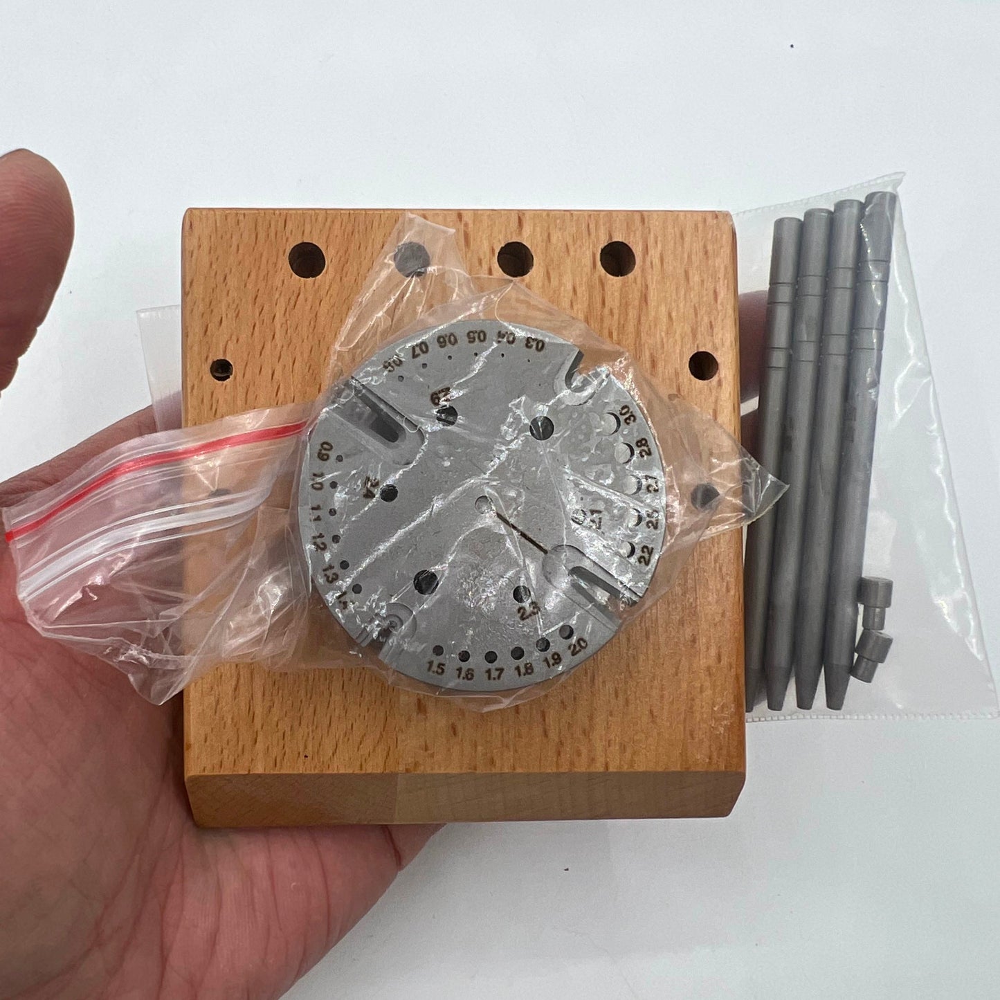 China-made watch balance staff remover tool with hairspring installer for precise watch repairs.