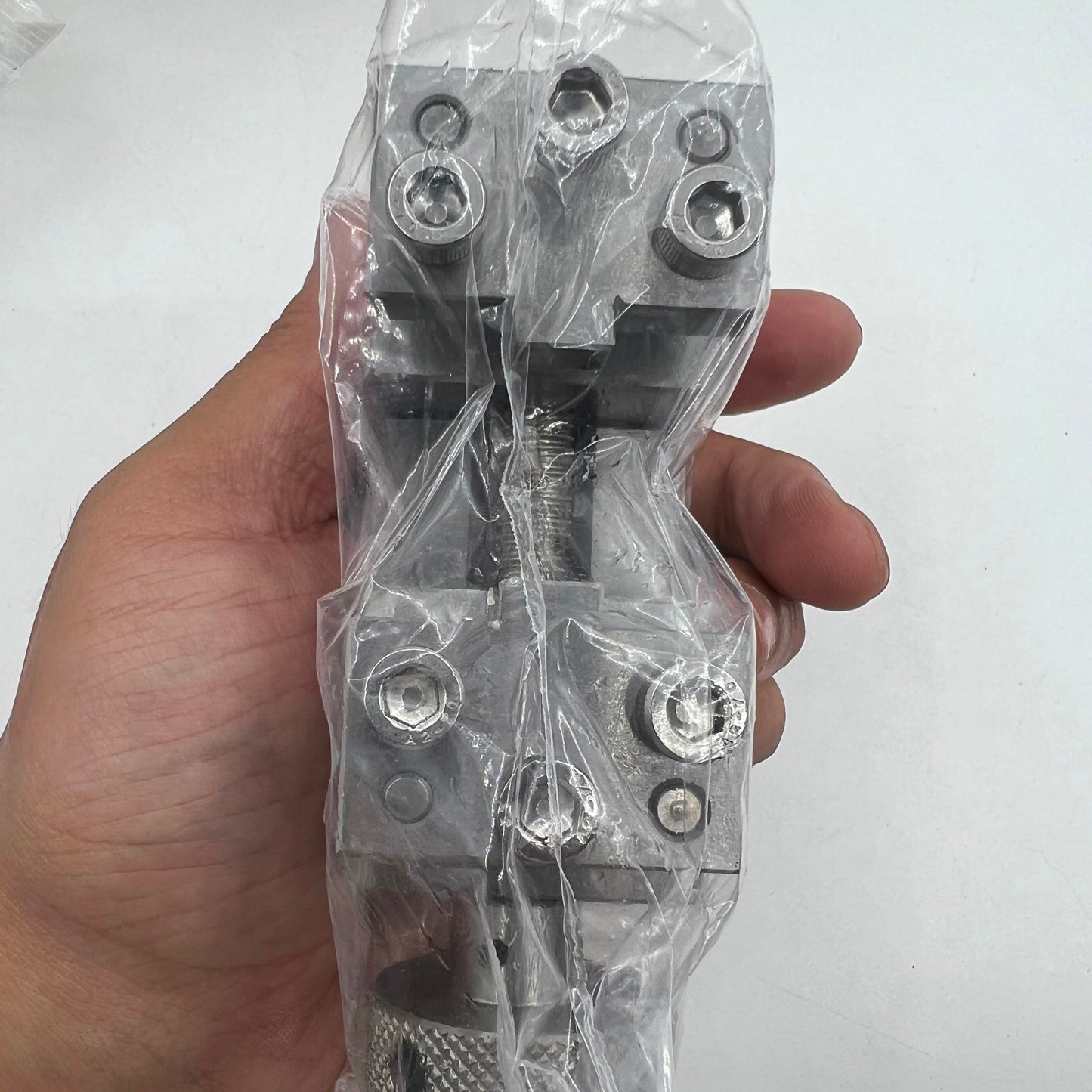 Oyster style stainless steel link remover tool for precise watch band resizing and adjustments