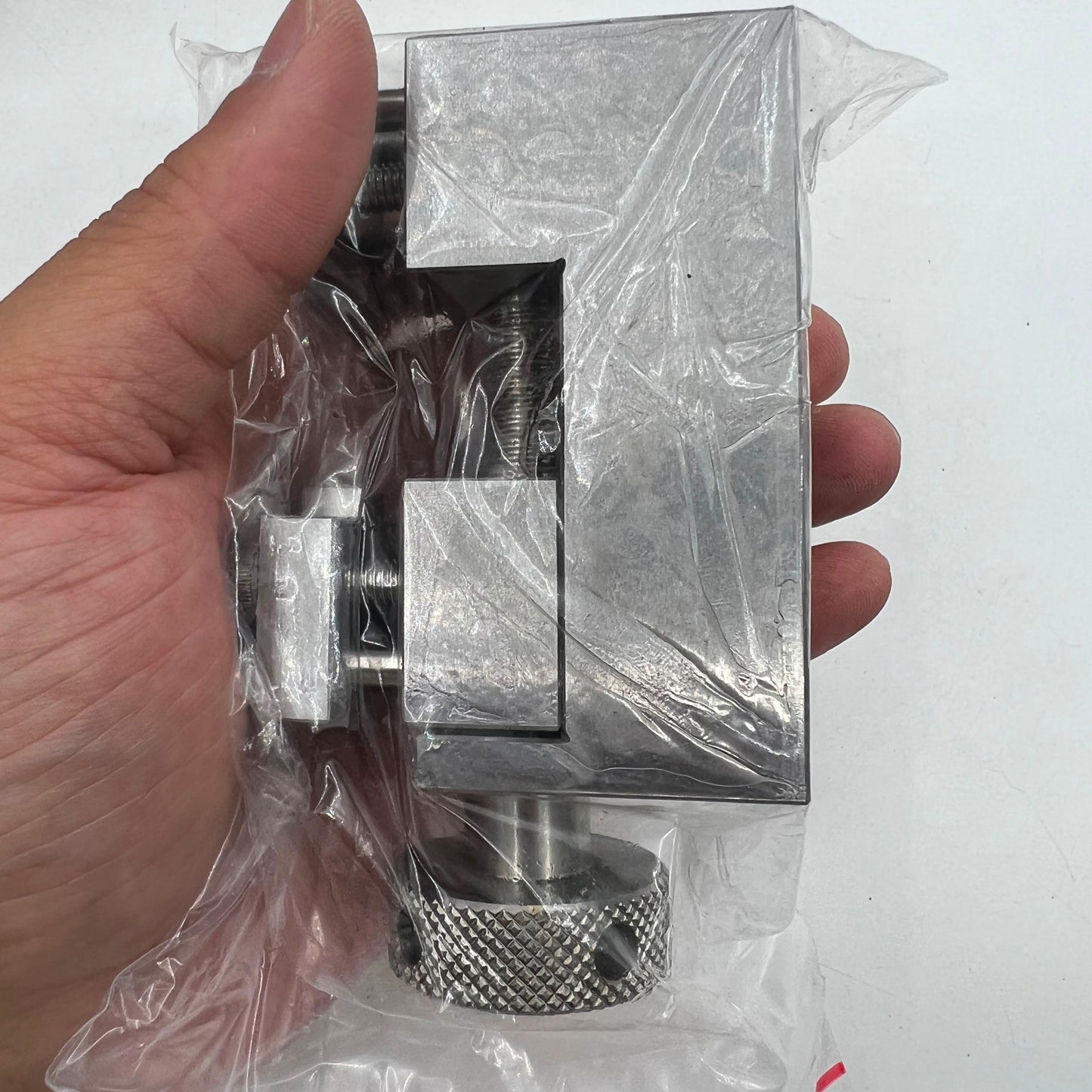 Oyster style stainless steel link remover for accurate watch band sizing adjustments