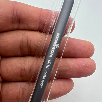 Bergeon 6016 tool removing watch hands precisely for professional watch repair and maintenance.