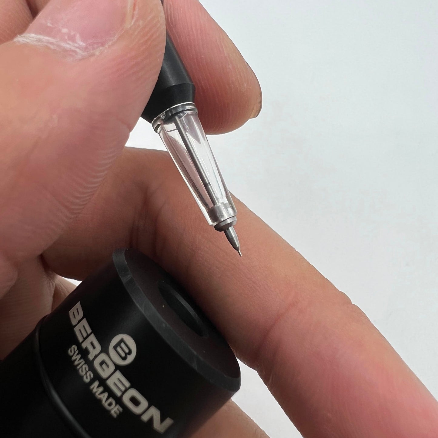 Bergeon 7718-1A precision automatic watch and clock oiler tool for accurate timepiece lubrication.