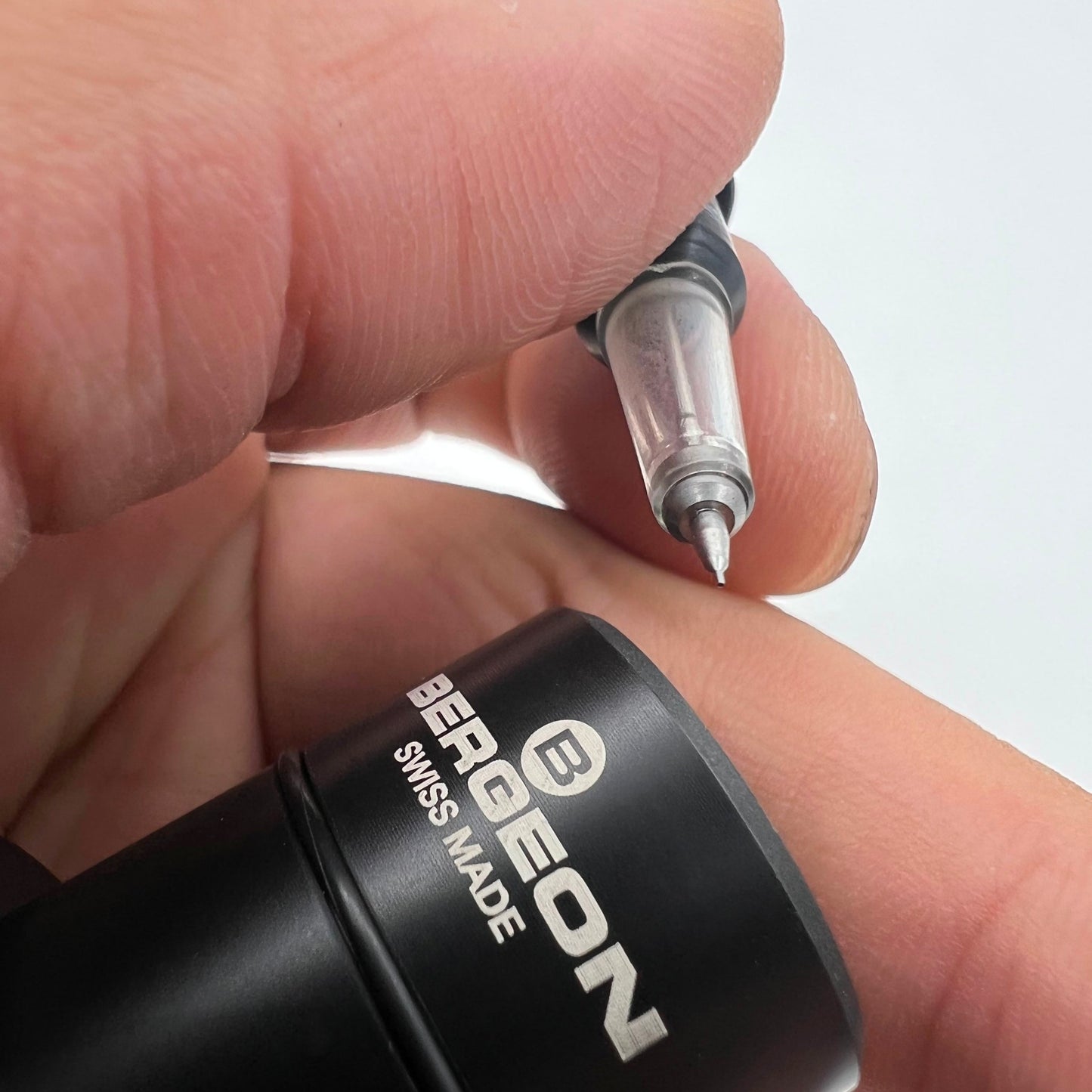 Bergeon 7718-1A automatic watch oiler tool for precise lubrication of watch movements.