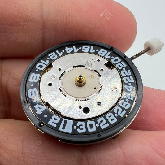 Original ISA8176A quartz watch movement with black dial, Swiss made, ideal for watch repairs and accessories.