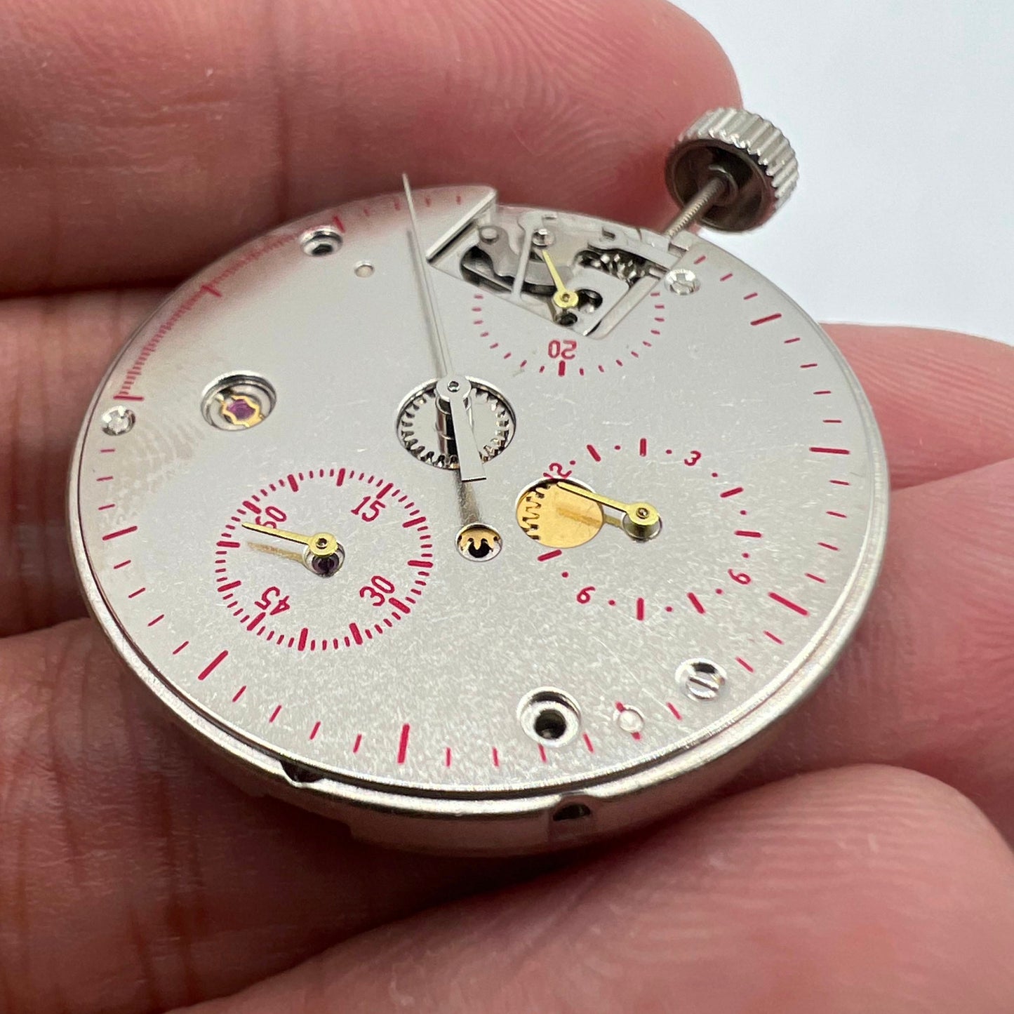 Tianjin Seagull ST1903 watch movement showing 24-hour display, precision manual mechanical gear.