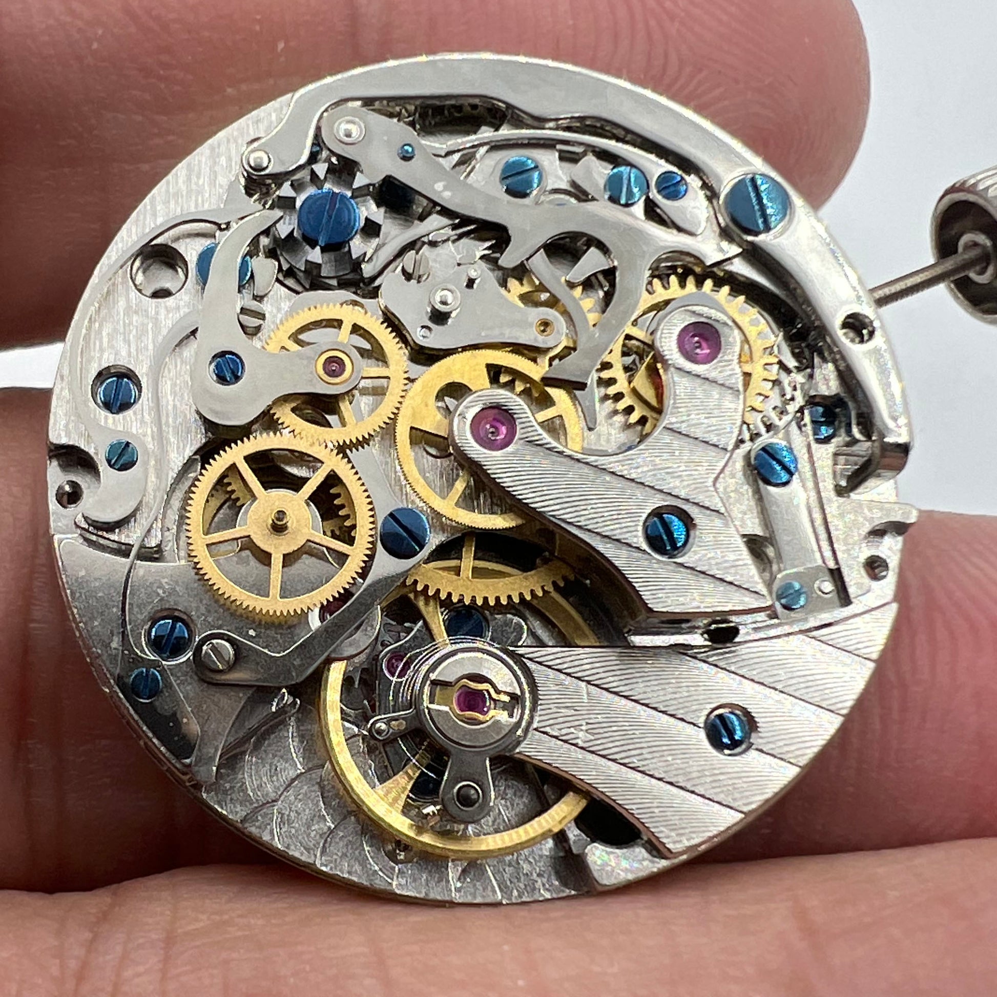 Tianjin Seagull ST1903 manual watch movement with 24-hour display and precise mechanical gears.
