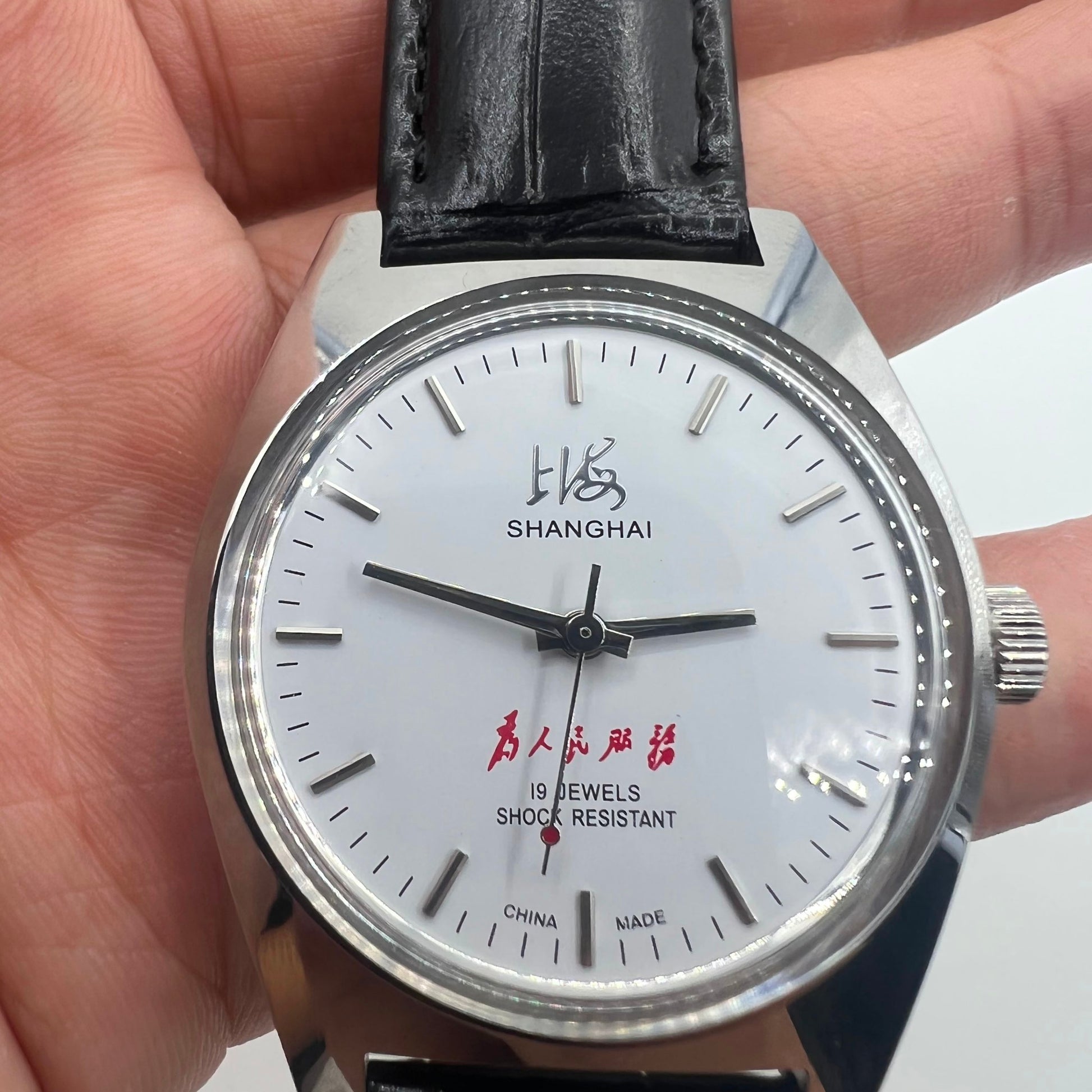 37mm Shanghai Factory 7120 men's manual mechanical watch with shock-resistant feature and classic design.