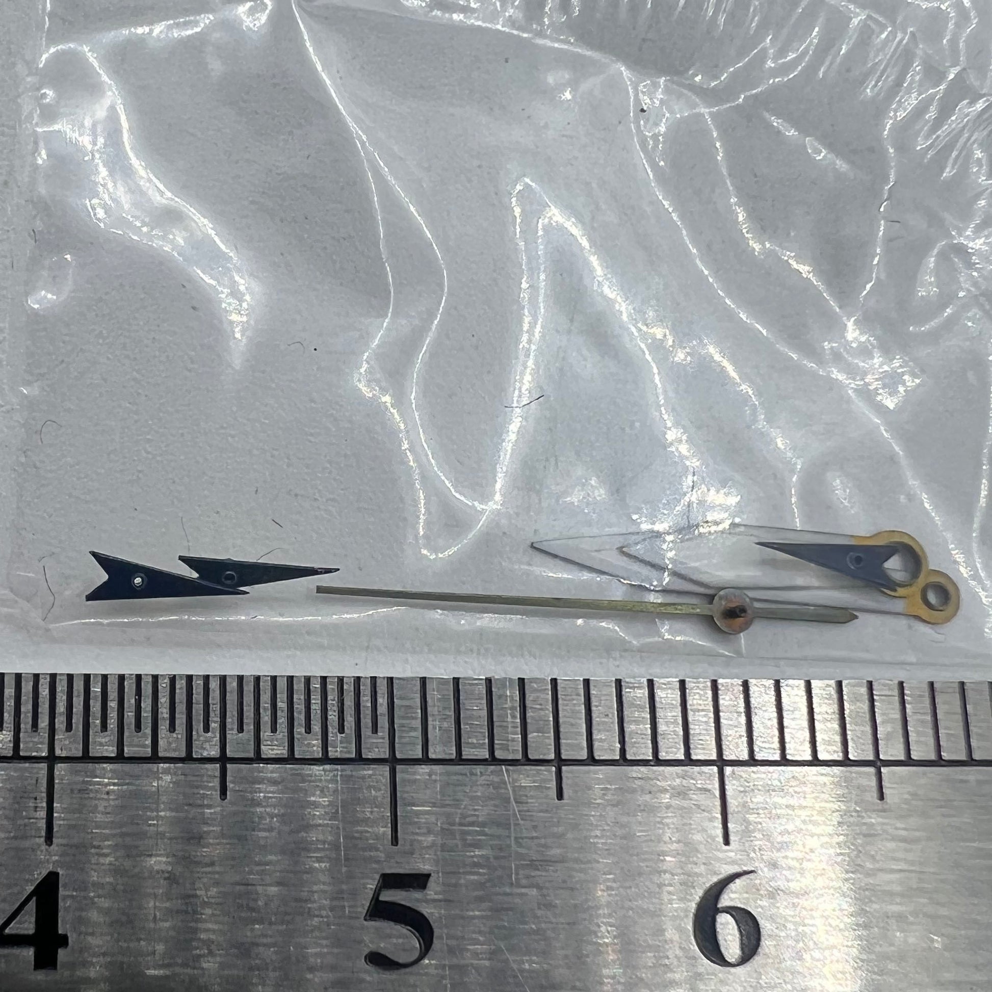 Dark blue arrow-shaped 13mm watch hands for Miyota OS series, precise and stylish time display.