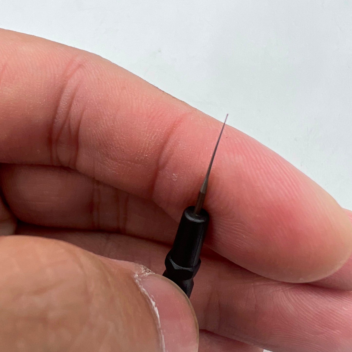 Bergeon 30102-N black watch dip oiler for precise application in watch repair and maintenance.