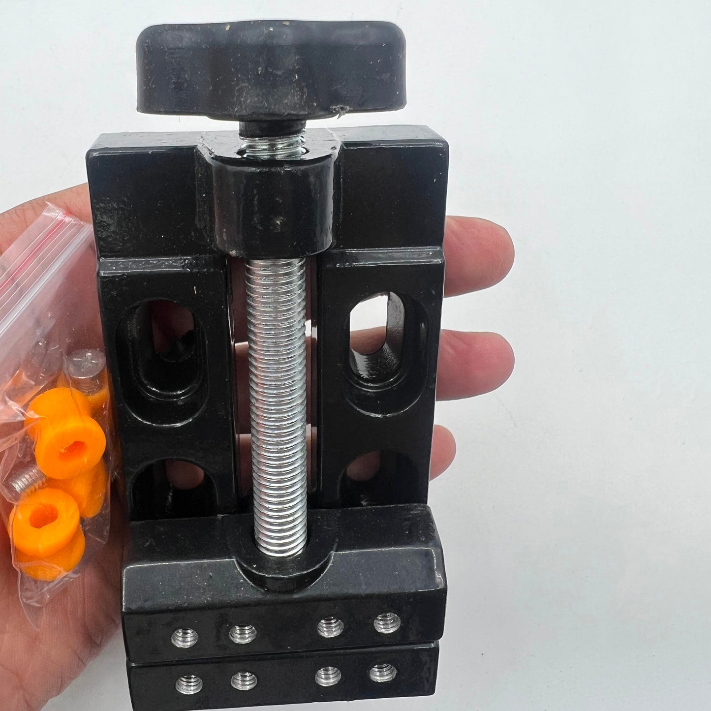 Mini electric drill with flat vice and clip opening table clamp, ideal for precise jewelry crafting.