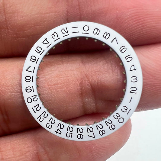 White date disk wheel with black font for ETA2836 movement, date display at 3 o'clock position.