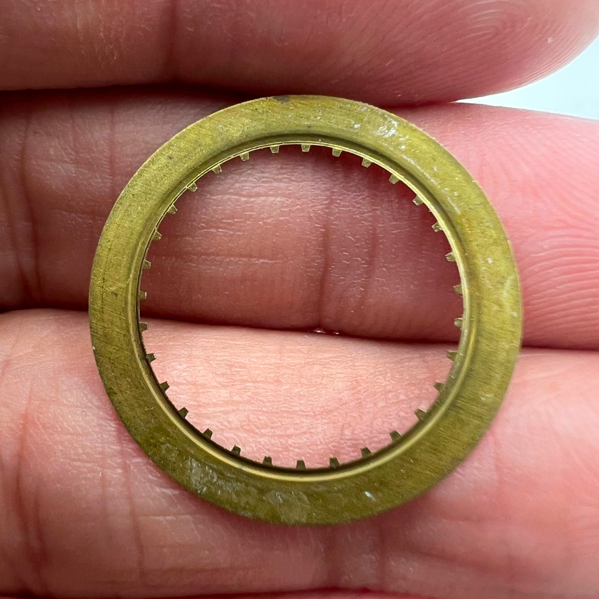 White date disk wheel featuring black numerals for ETA2836 movement, date window at 3 o'clock.