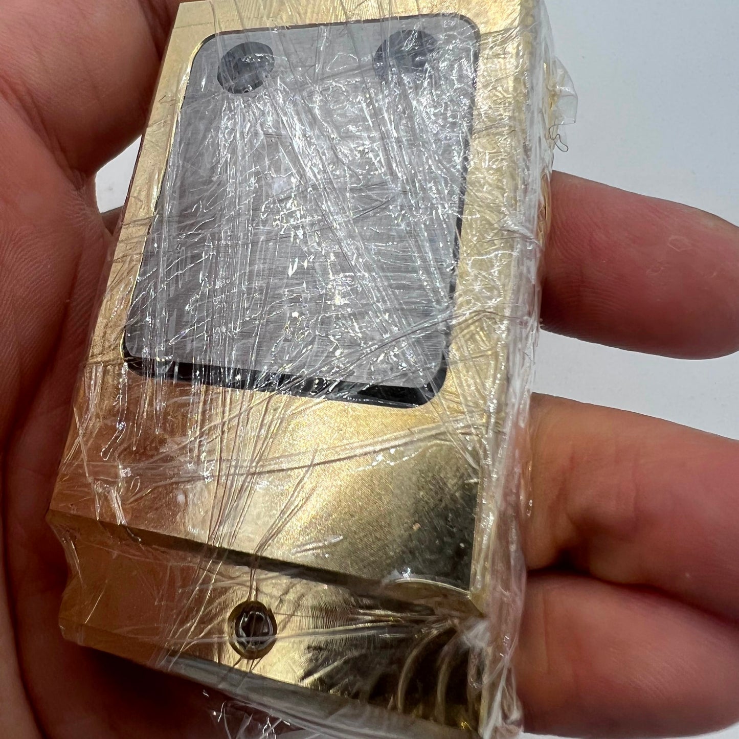 Brass and stainless steel Woodcutter pegwood tool for detailed watch cleaning and repair.