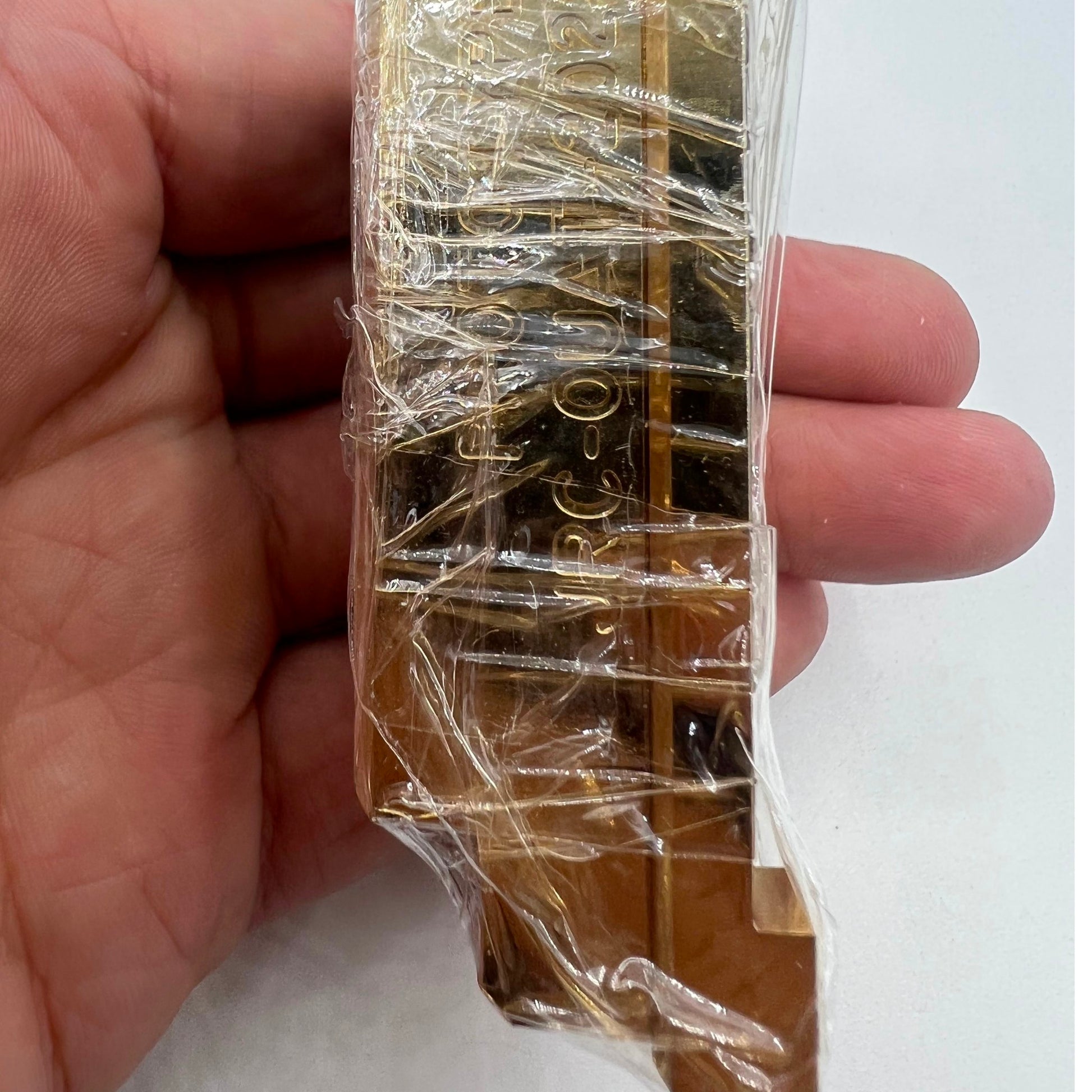 Woodcutter brass & stainless steel pegwood tool for precise watch repair and cleaning.