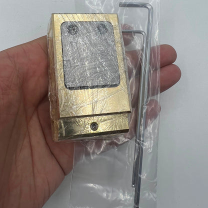 Woodcutter brass and stainless steel pegwood tool for precise watch repair and cleaning tasks.