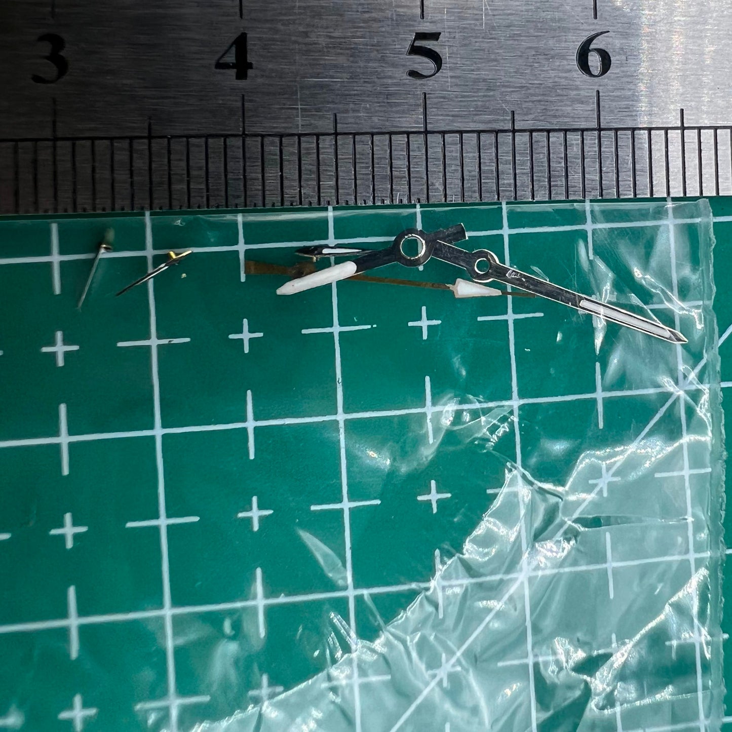 Silver and black 13mm luminous watch hands for Miyota OS series, precise glow for night readability.