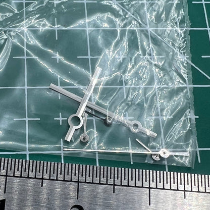 Silver watch hands with trim for Ronda 5030.D quartz movement, perfect for precision watch repairs.