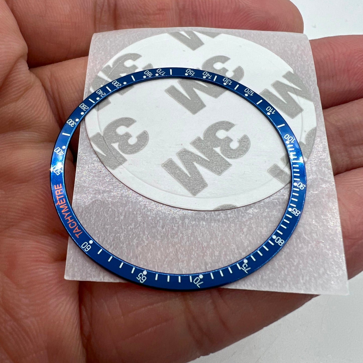 Blue aluminum alloy watch bezel with white and orange font for Omega Speedmaster accessories