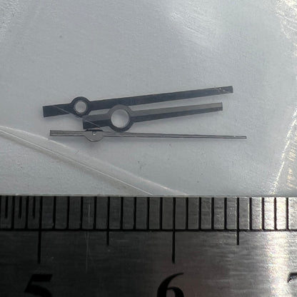 Black trim watch hands with no lume, compatible with NH35, NH36, 4R, and 7S movements, ideal for precise repairs.