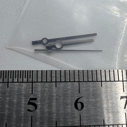 Black trim watch hands with no lume, compatible with NH35, NH36, 4R, and 7S movements, ideal for precise repairs.