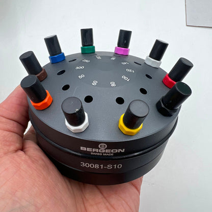 Bergeon 30081-S10 ergonomic watchmakers screwdriver set with rotating stand for precise watch repairs.