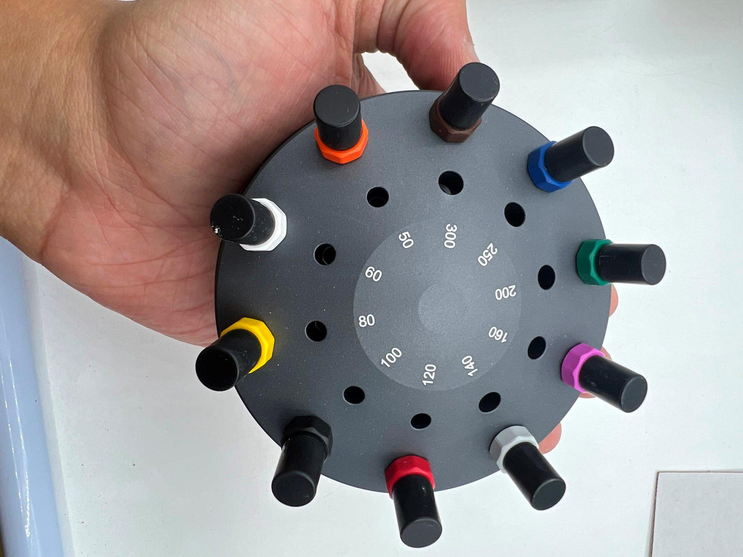 Bergeon 30081-S10 ergonomic screwdrivers set with rotating stand for precise watch repair tasks.