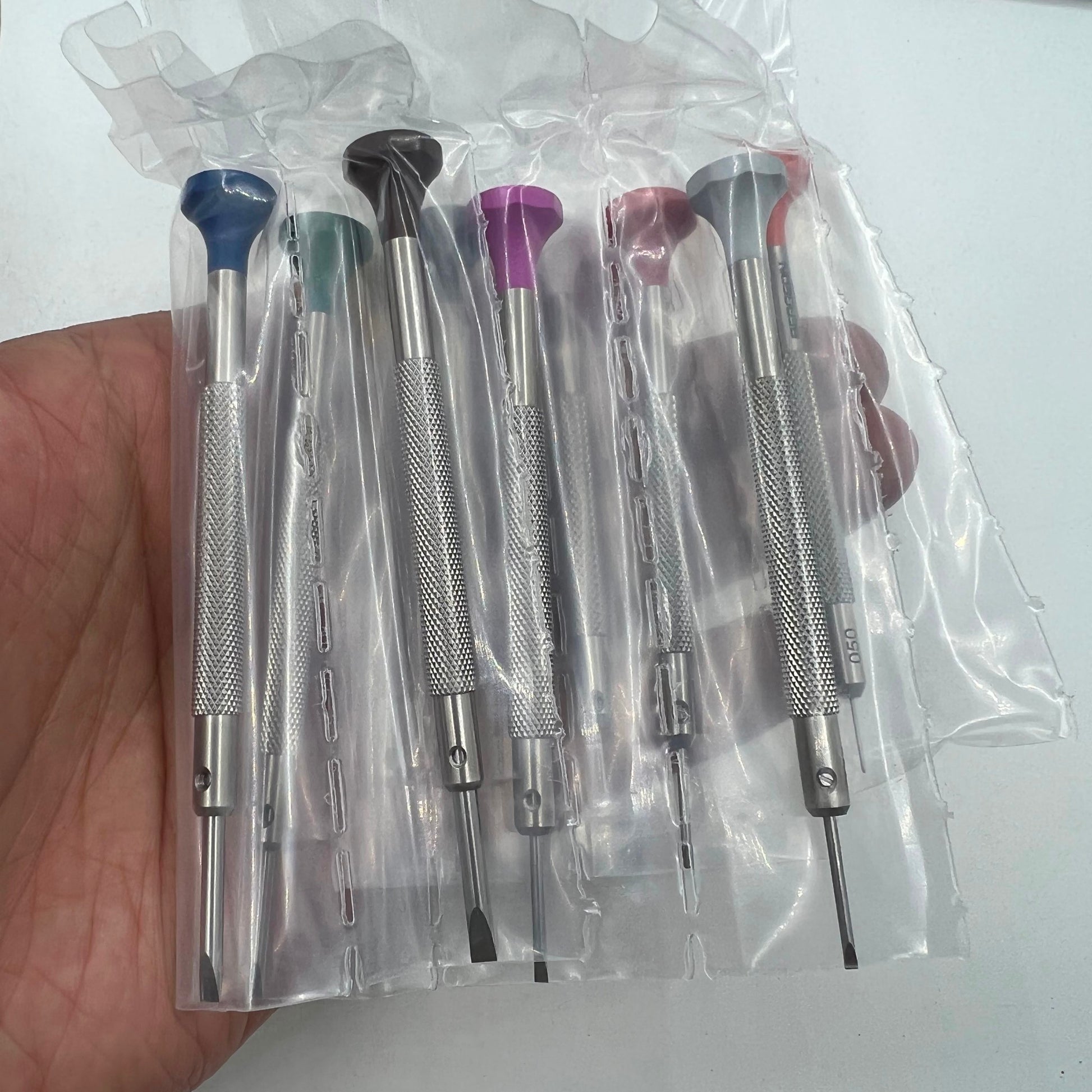 Bergeon 30081-S10 ergonomic watchmakers screwdrivers set with rotating stand for precise watch repair tasks.