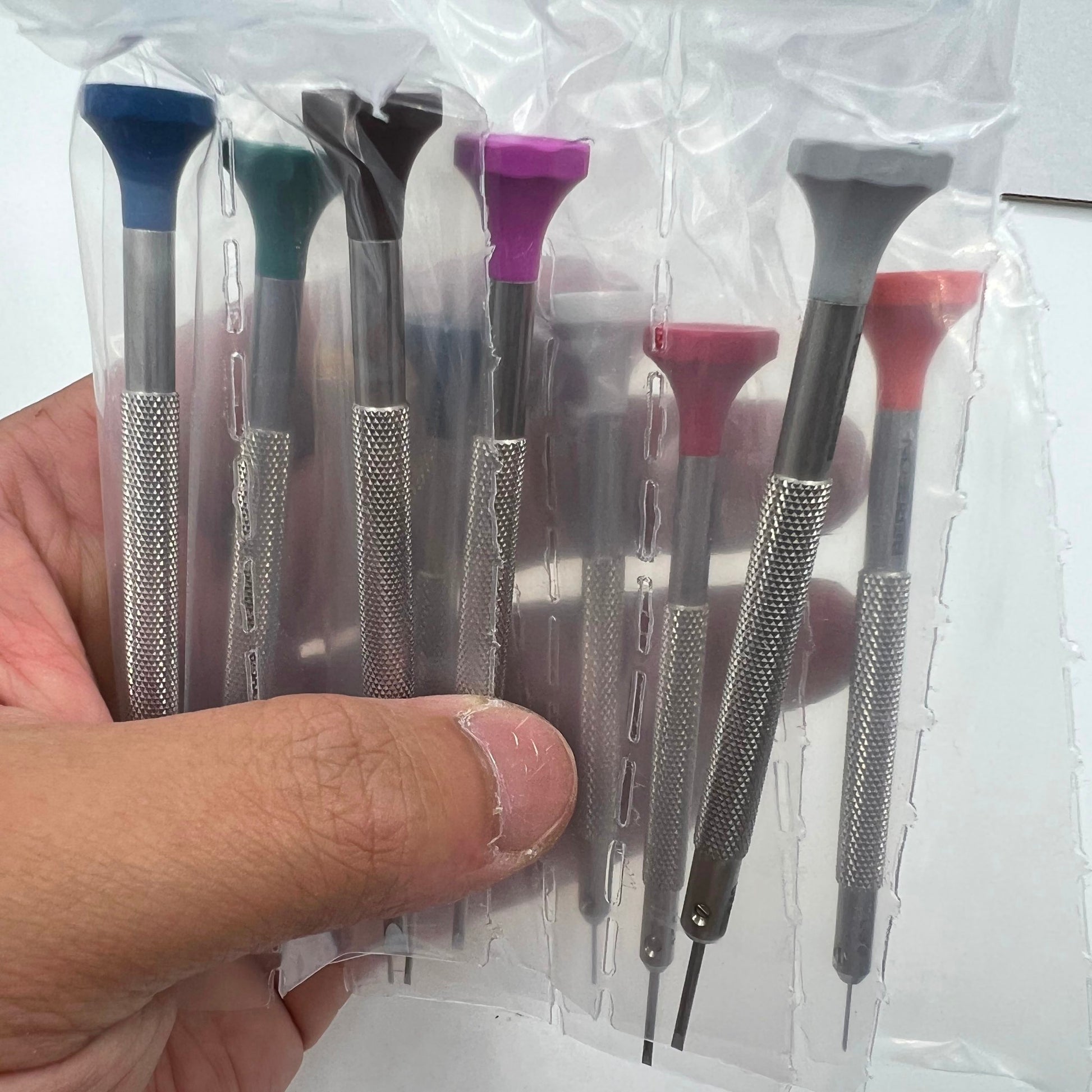 Bergeon 30081-S10 ergonomic watchmakers screwdriver set with rotating stand for precise watch repairs.