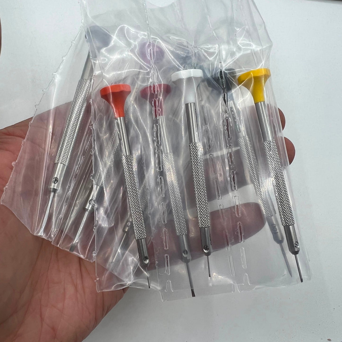 Bergeon 30081-S10 ergonomic watchmakers screwdrivers set with rotating stand for precise watch repair tasks.