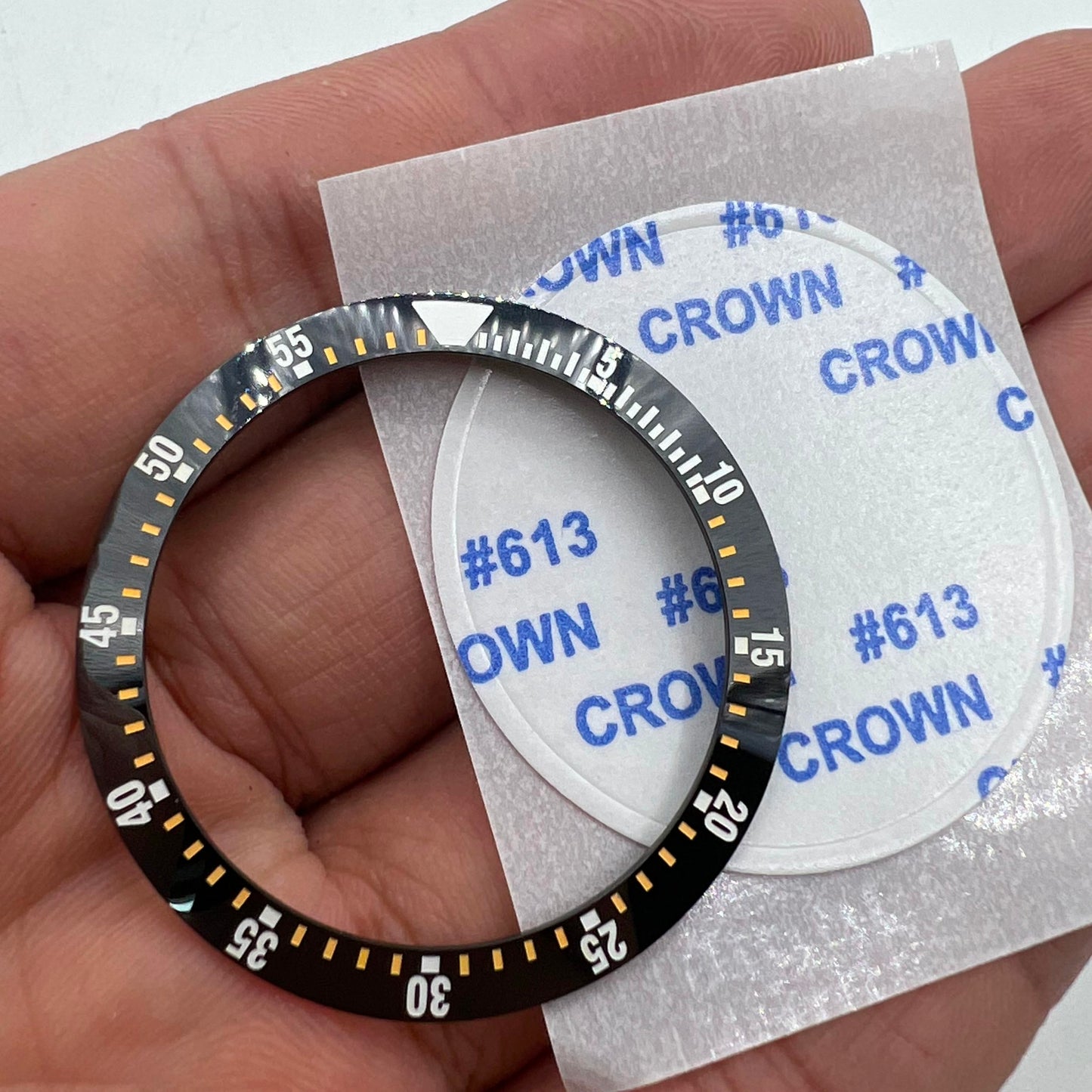 Black ceramic bezel insert with yellow graduation for 38mm/30.5mm watches, durable replacement part.