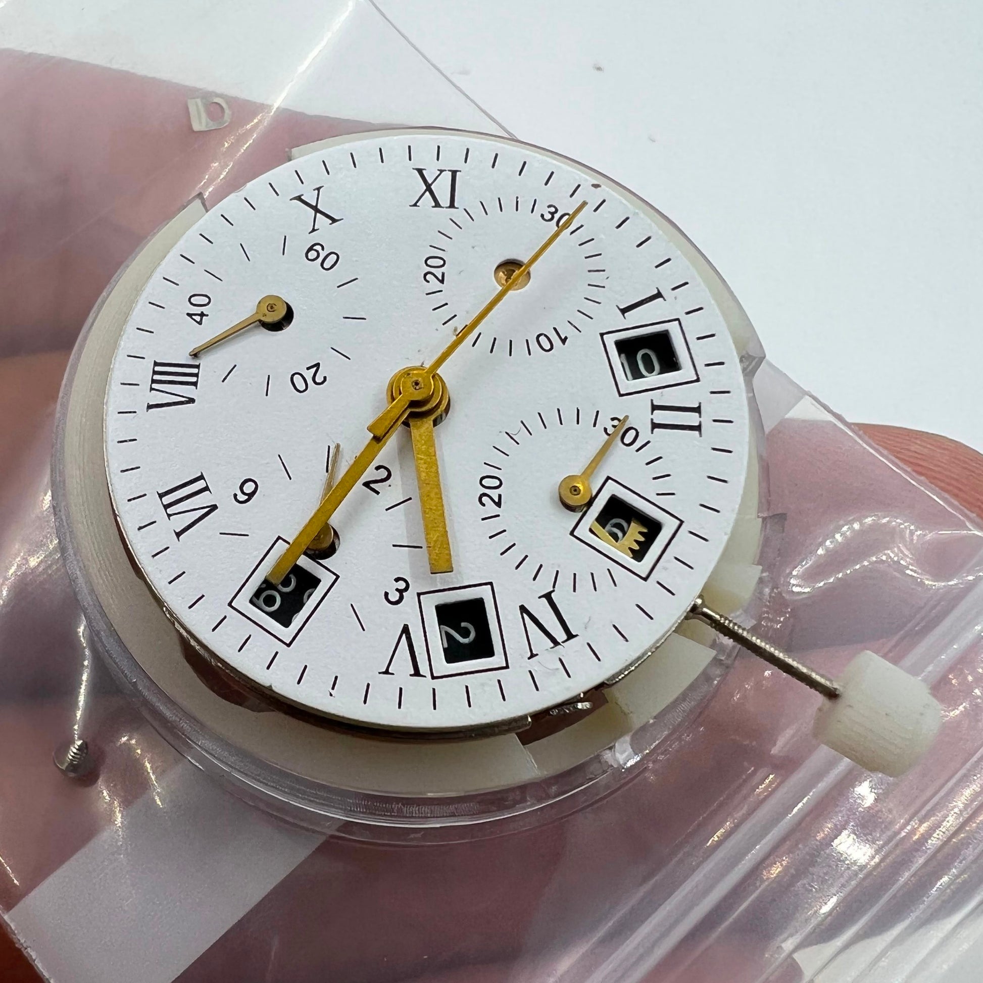 Automatic Chronograph watch with Asian 7750 movement, black dial, calendar at 4.5, seconds subdial at 9, ETA 7750 mechanism.