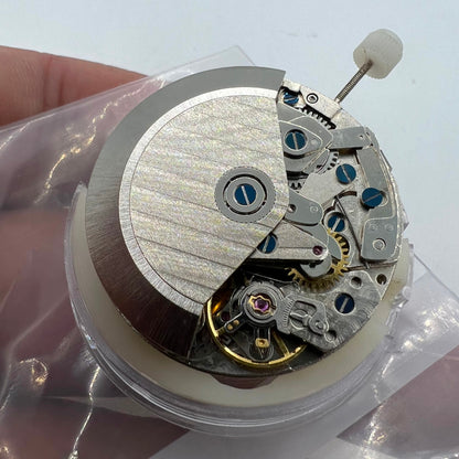 Automatic Chronograph watch with Asian 7750 movement, black dial, calendar, and seconds subdial.