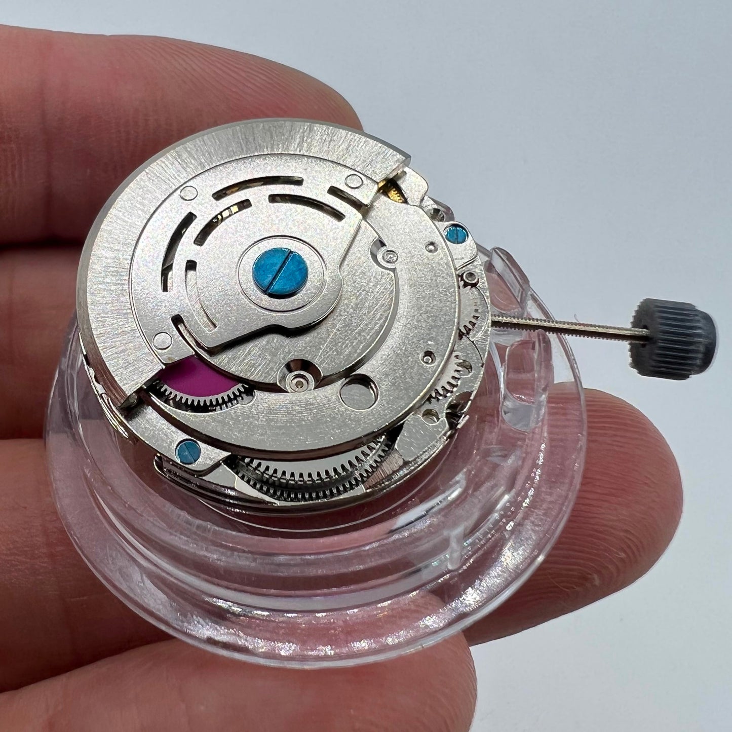 DG2813 watch movement displaying three large hands and a small seconds subdial at 6 o'clock, no date function.