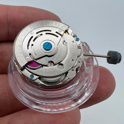 DG2813 watch movement displaying three large hands and a small seconds subdial at 6 o'clock, no date function.