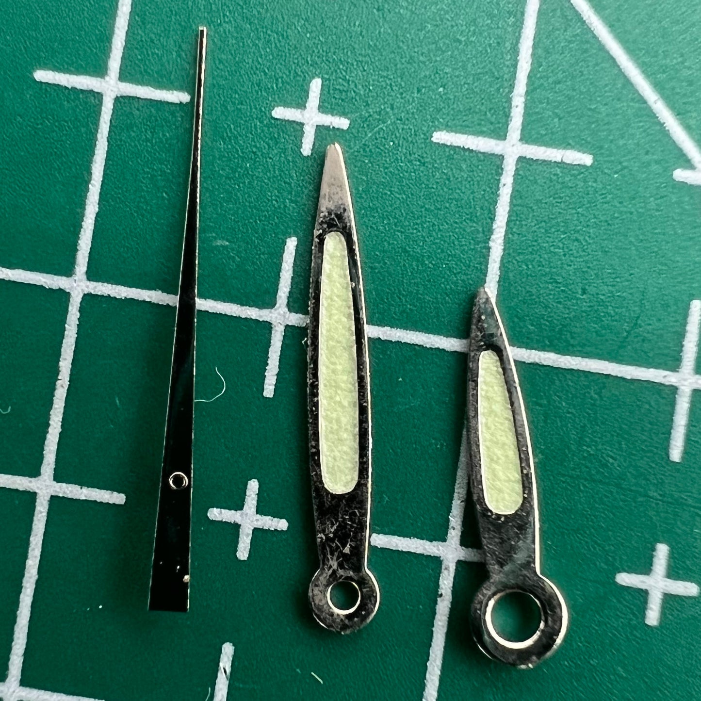 Luminous green arrow-shaped watch hands set for Miyota 2035, perfect for night visibility and style.