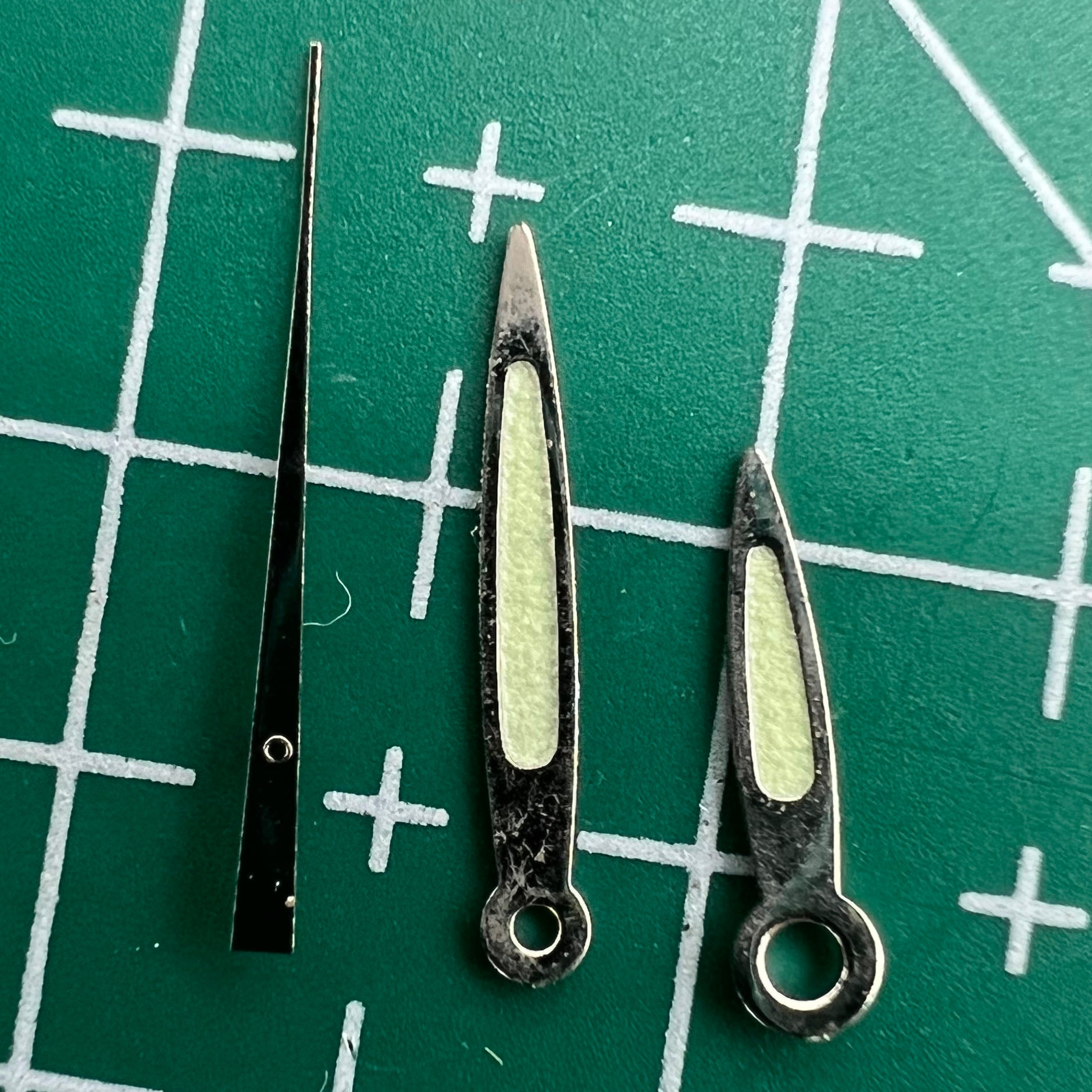 Luminous green arrow-shaped watch hands set for Miyota 2035, perfect for night visibility and style.