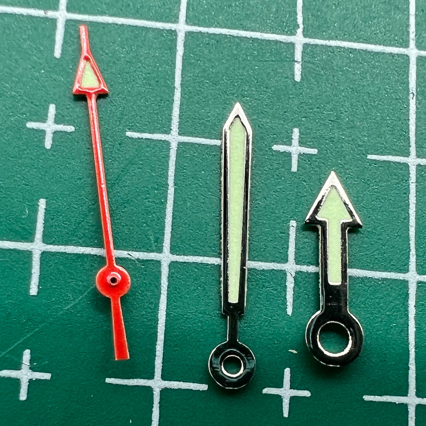 Arrow-shaped green luminous watch hands set for Miyota 2035 movement, perfect for stylish repairs.