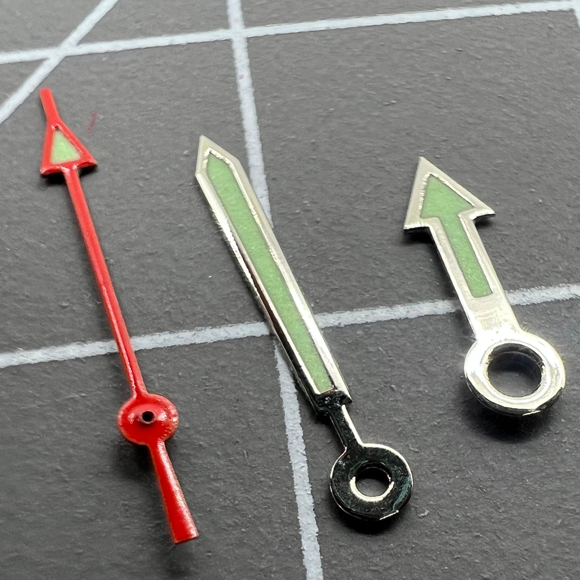 Arrow-shaped green luminous watch hands set, compatible with Miyota 2035, 2115, 2105, 2305 movements for precise timekeeping.