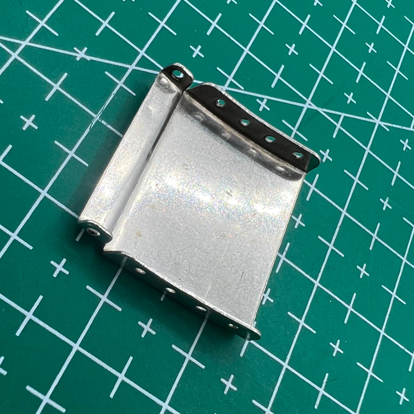 Set of 14 silver watch strap extenders with clasp for adjustable bracelet length.