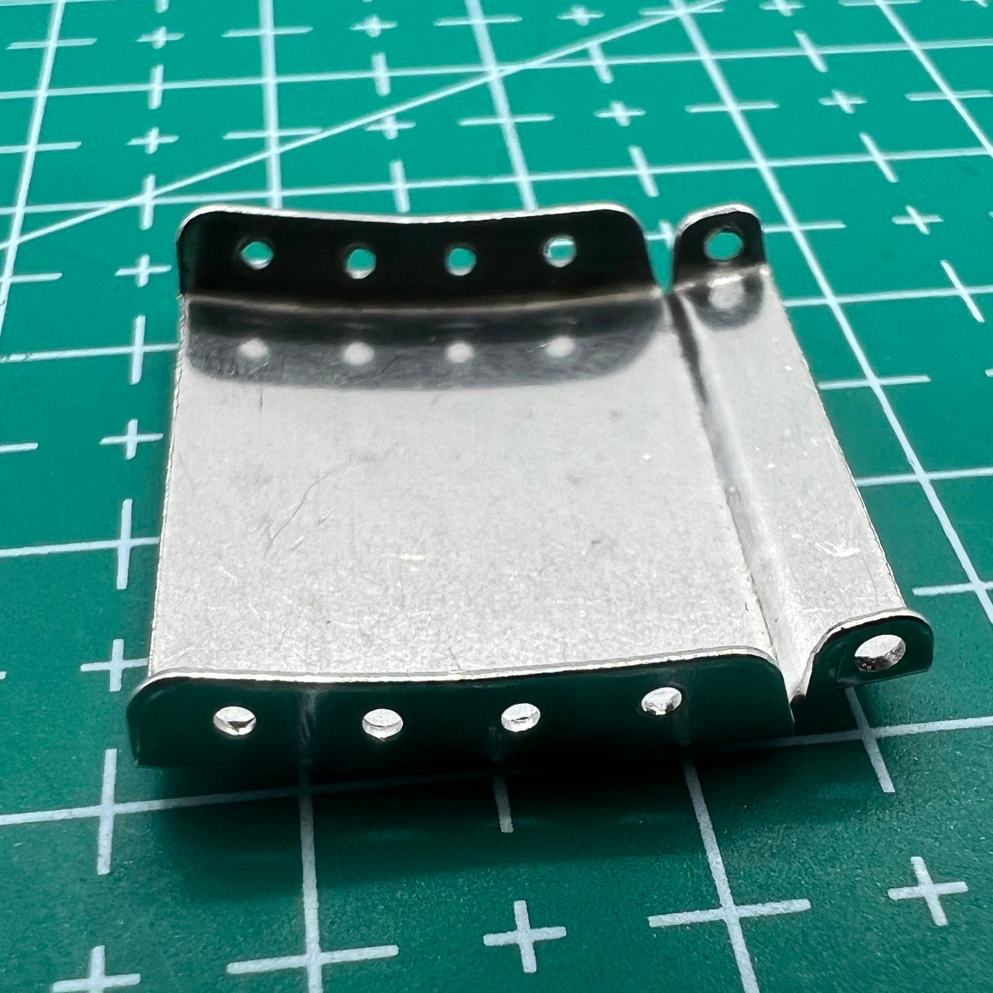 Set of 14 silver watch strap extenders with clasp, ideal for adjusting bracelet length comfortably.